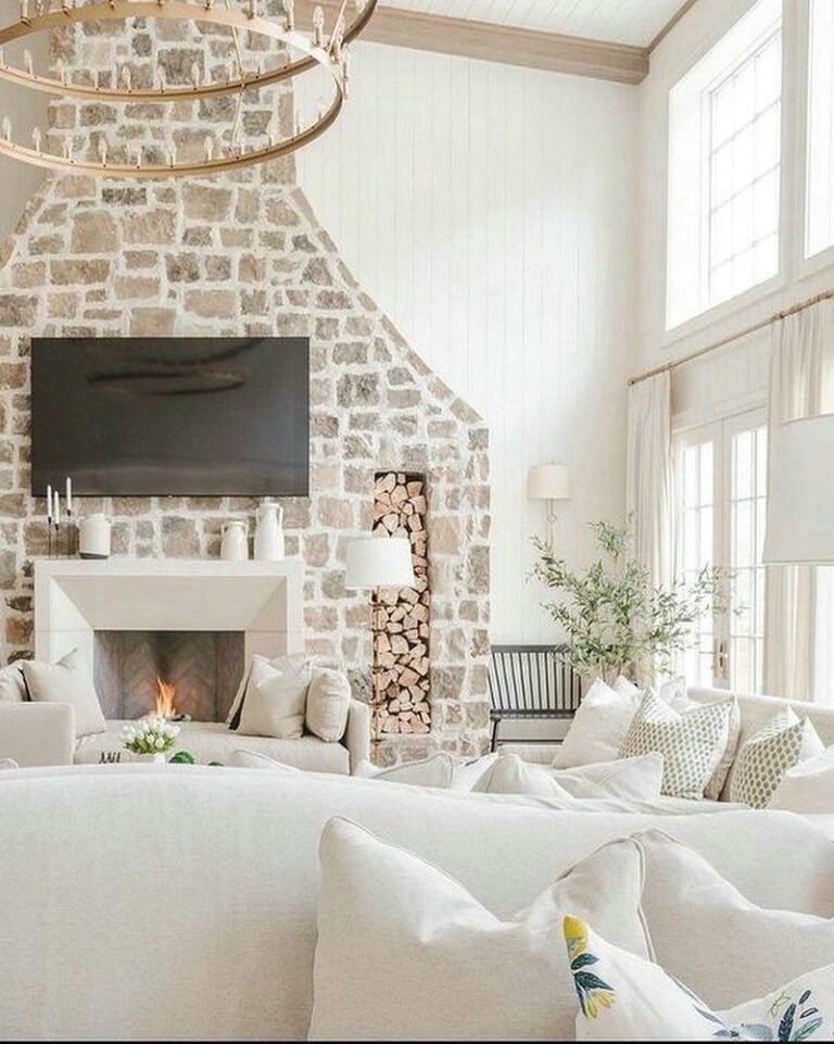 stone wall with tv and fireplace feature