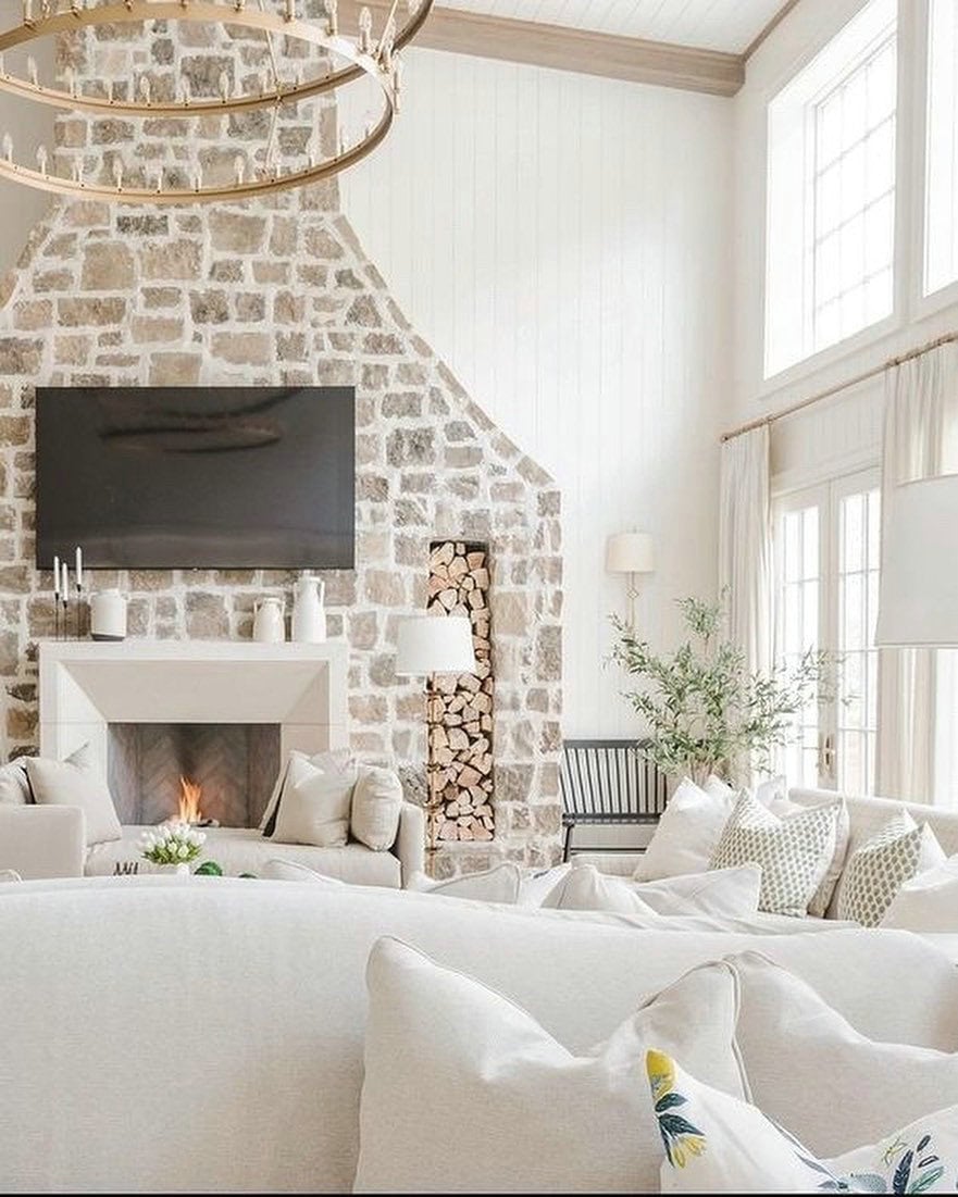 stone wall with tv and fireplace