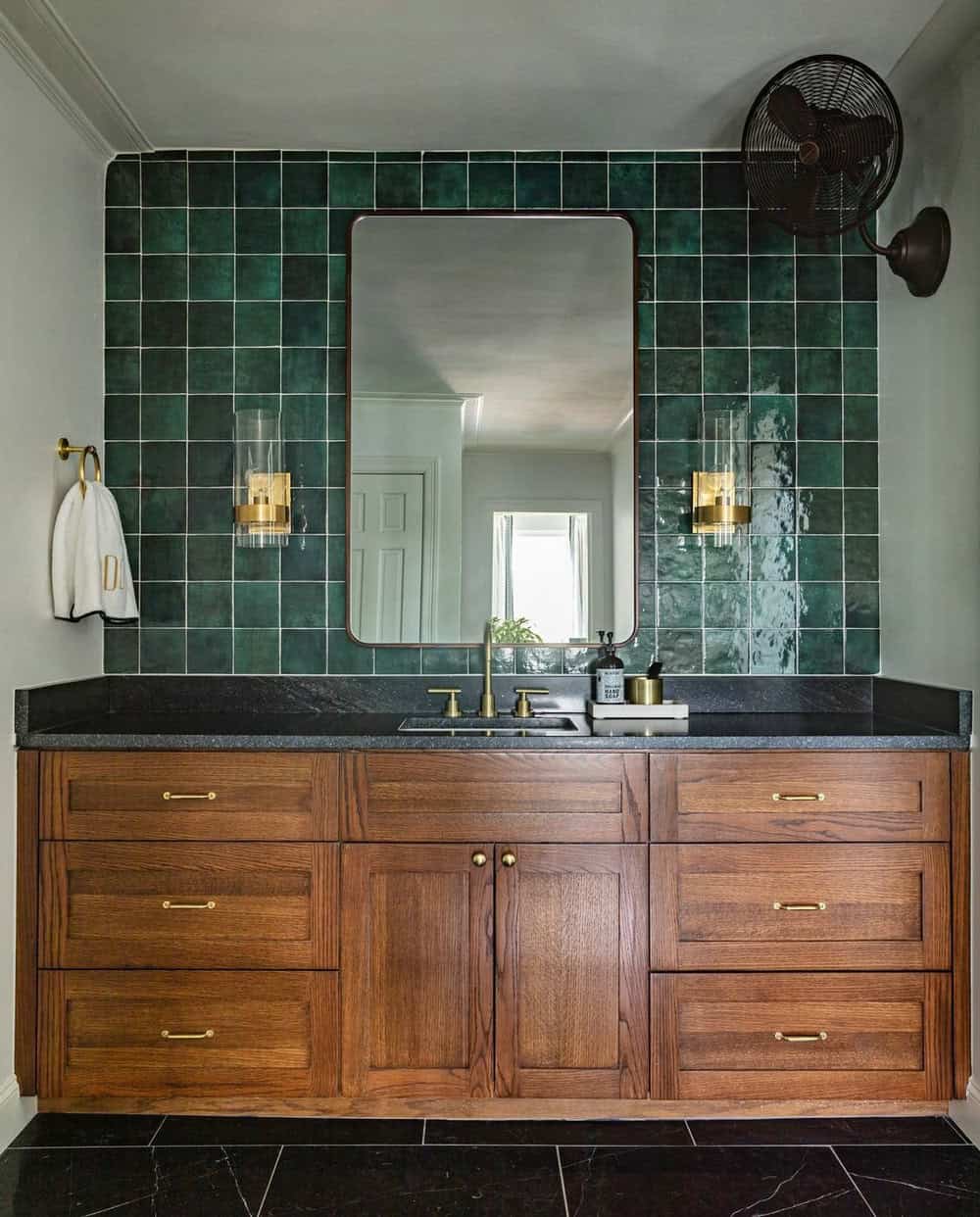 white backsplash with brown cabinets