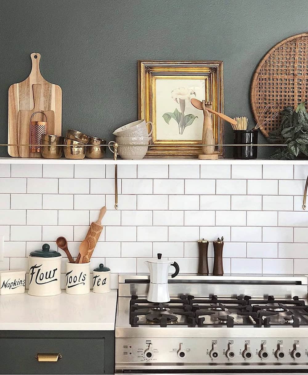 white subway tile backsplash with grey grout