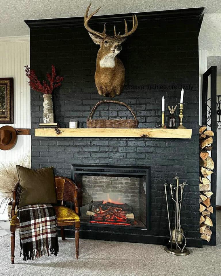 black accent wall with fireplace feature