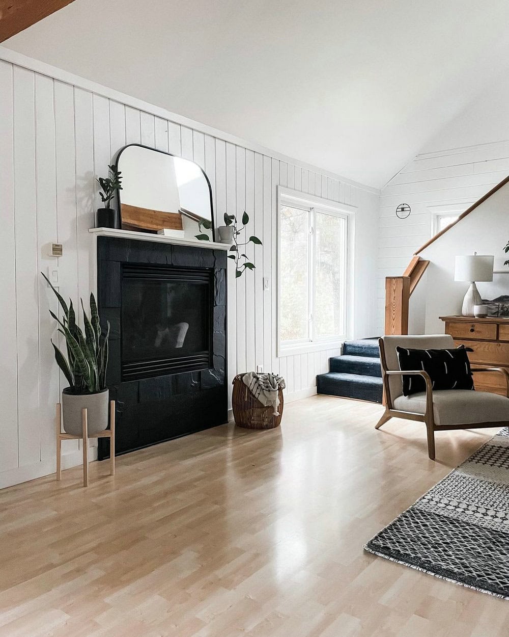 black painted stone fireplace