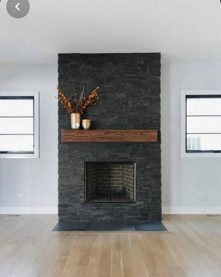 stone fireplace painted black feature