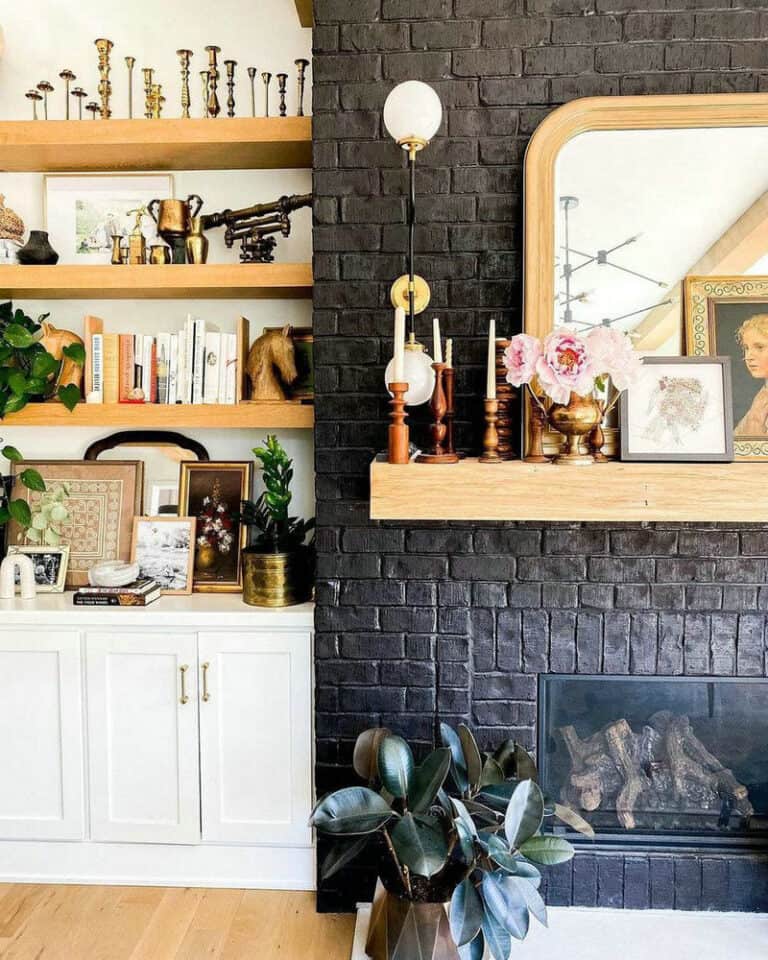 black brick fireplace with wood mantel feature