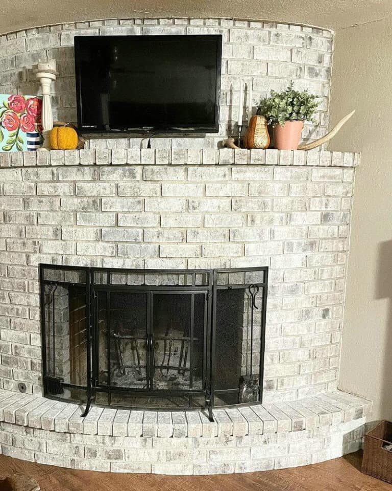 arched brick fireplace makeover feature