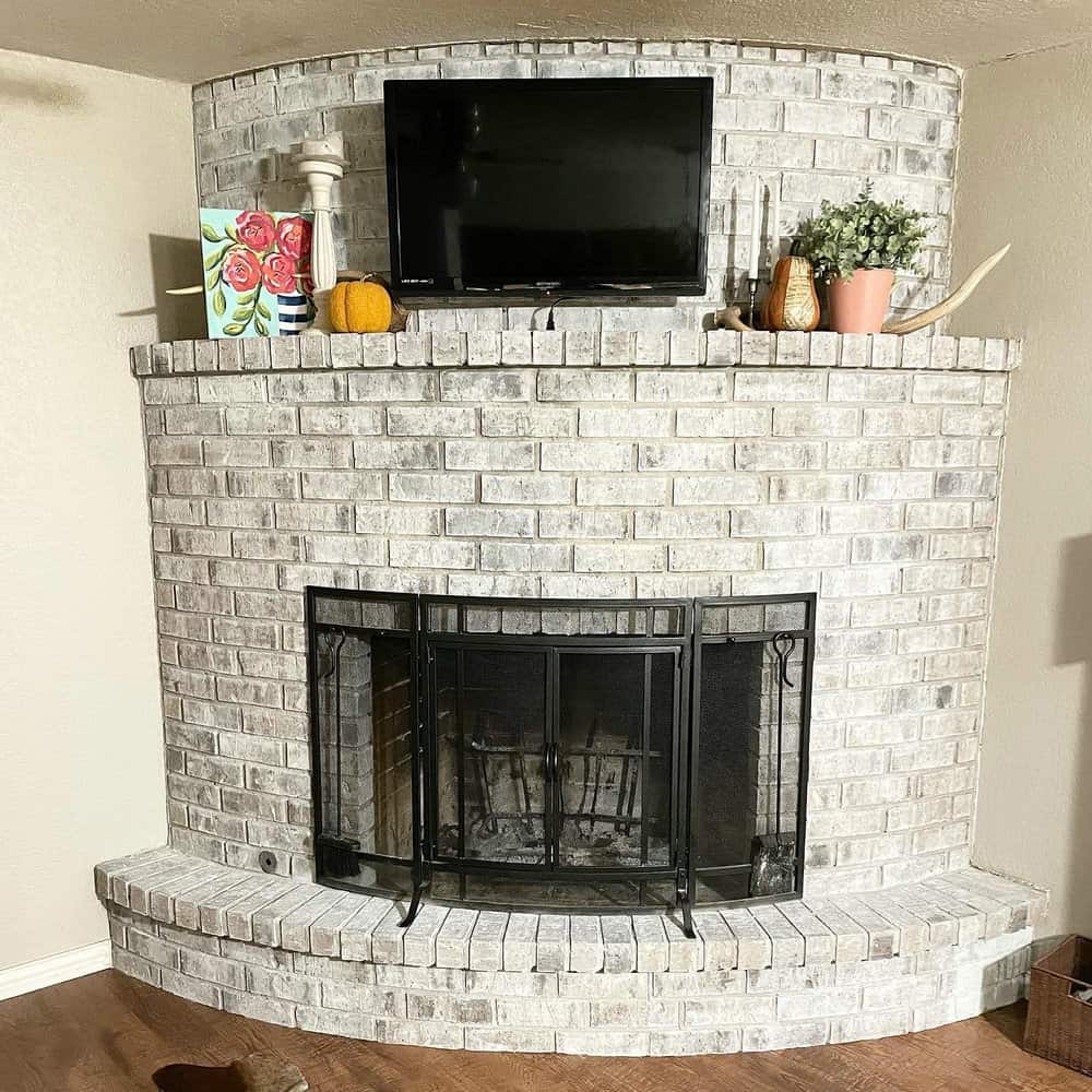 arched brick fireplace makeover