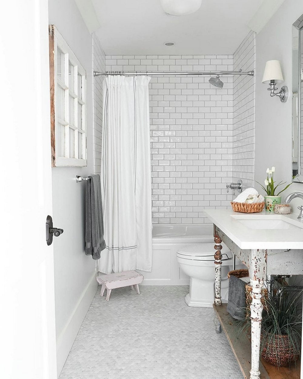 white subway tile grey grout kitchen