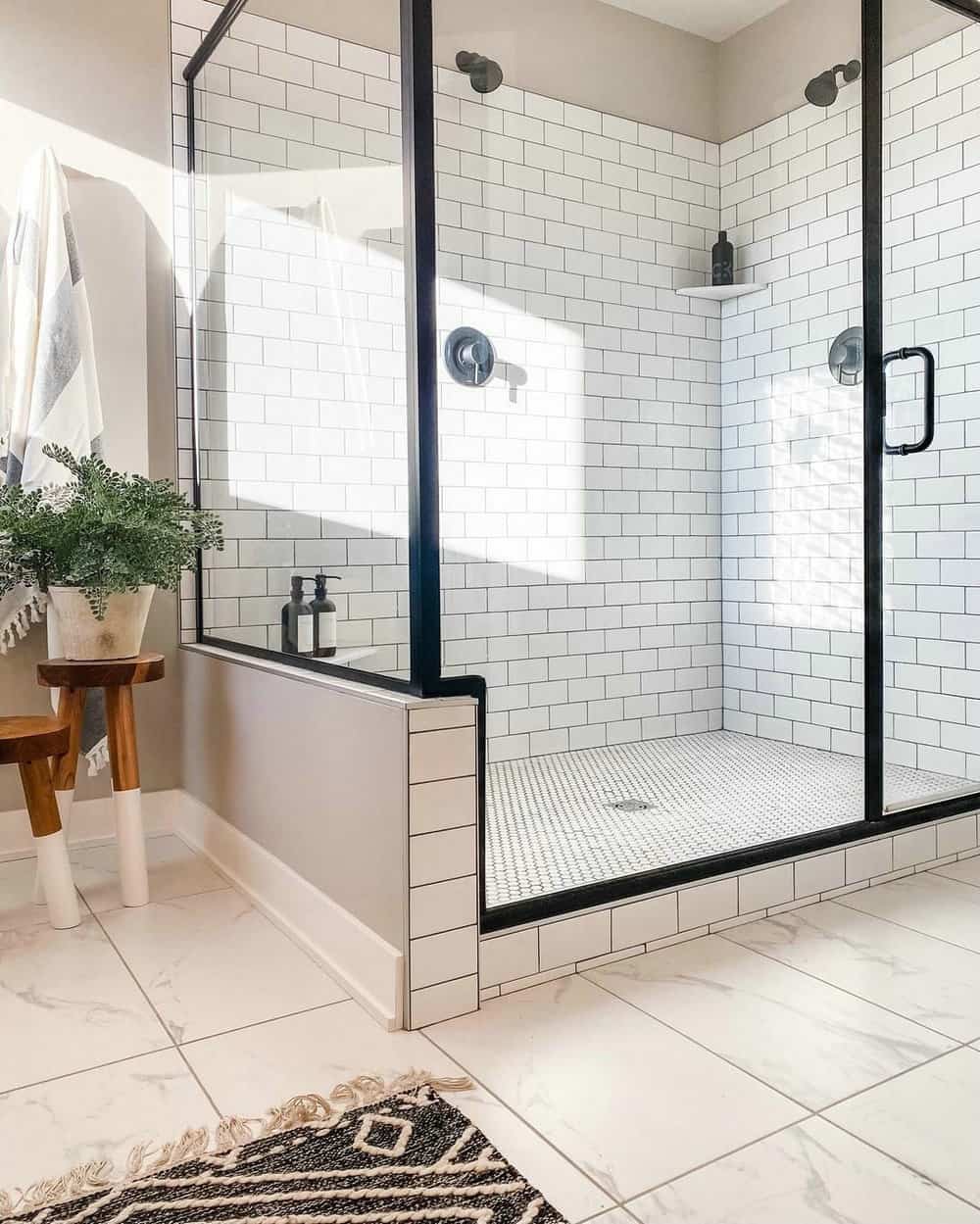 white subway tile with black grout shower