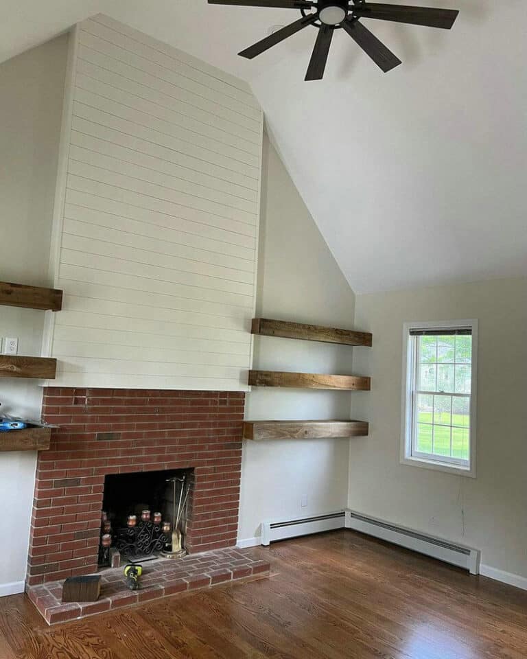 floor-to-ceiling brick fireplace makeover feature