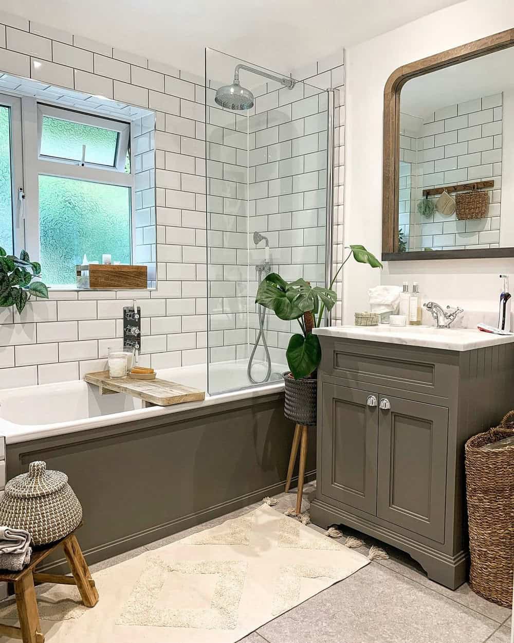 white subway tile with gray grout backsplash