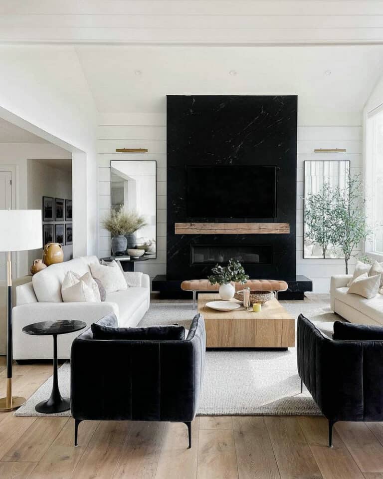 black tile fireplace with wood mantel feature