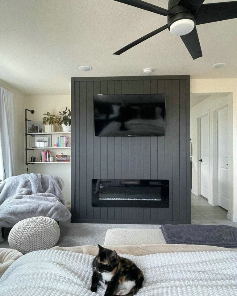 black shiplap wall fireplace feature