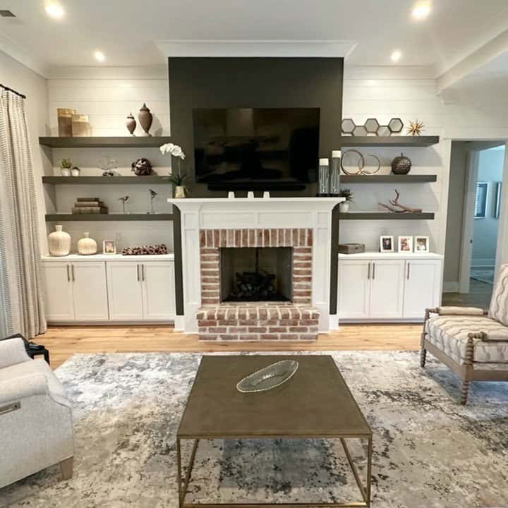 tv wall with fireplace and shelves