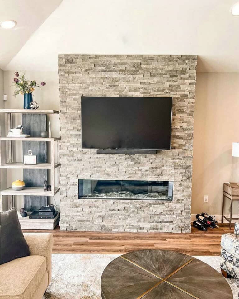 accent wall with electric fireplace and tv feature