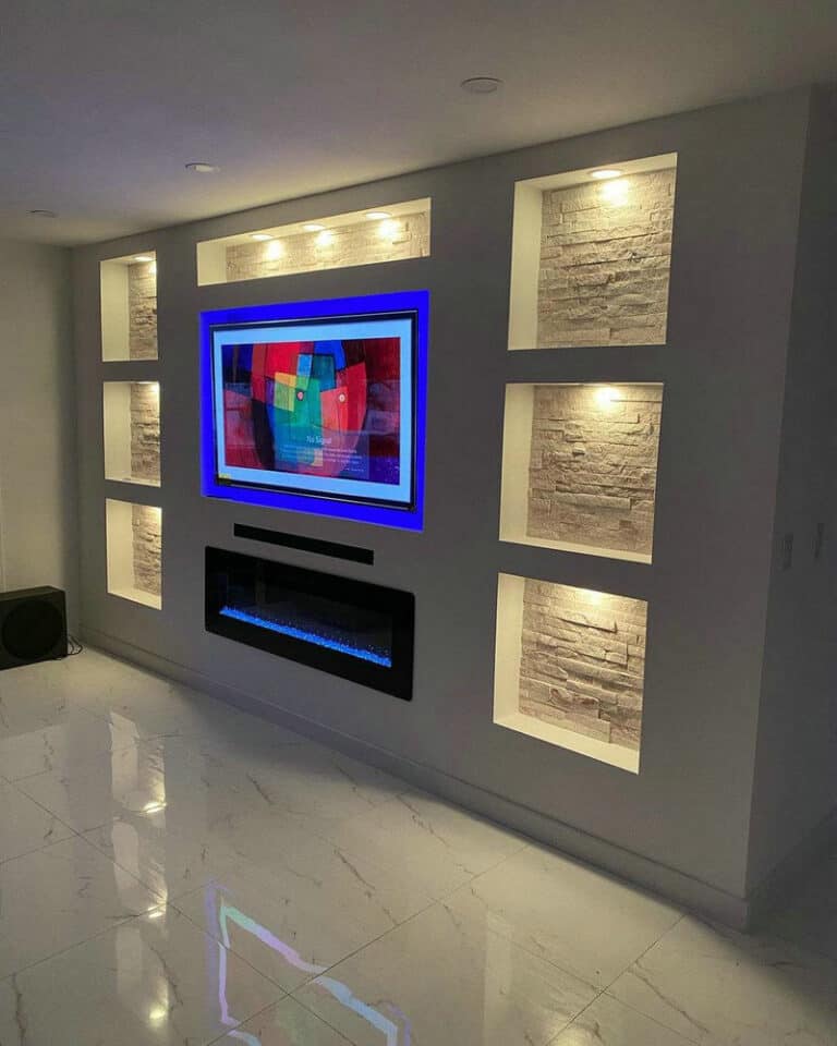 built in tv and fireplace wall feature