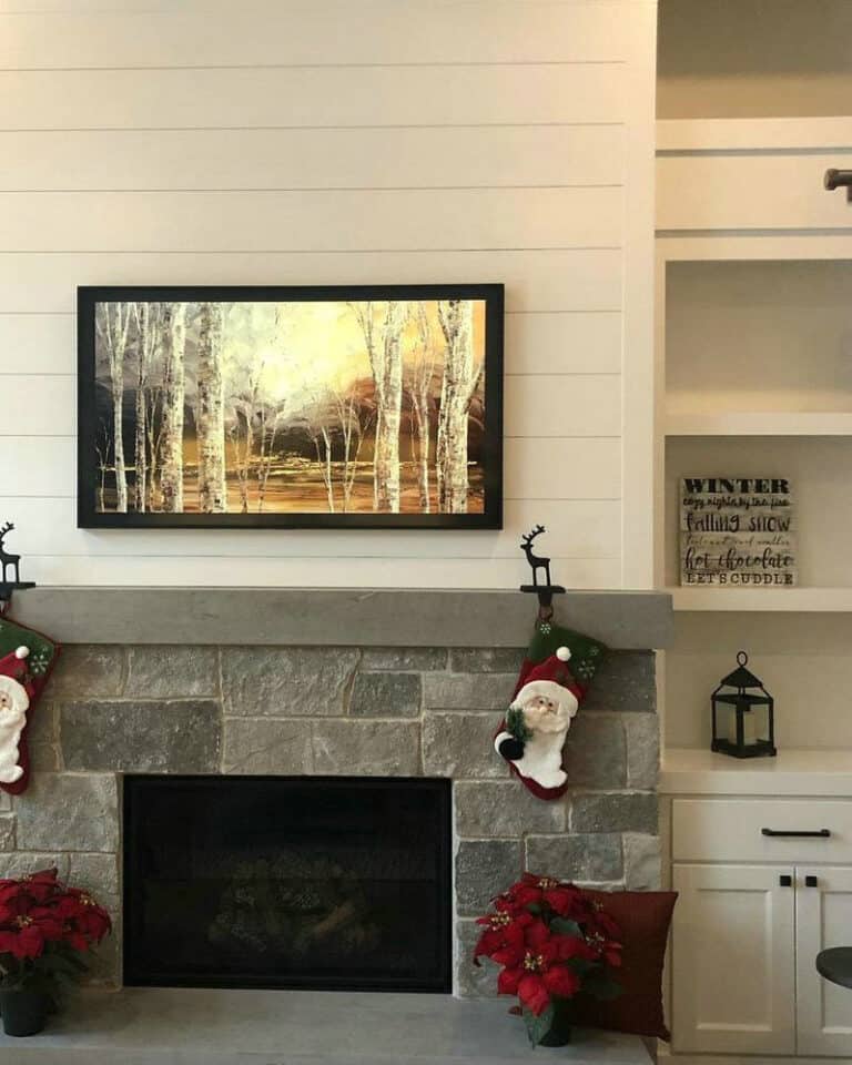 tv with electric fireplace underneath feature