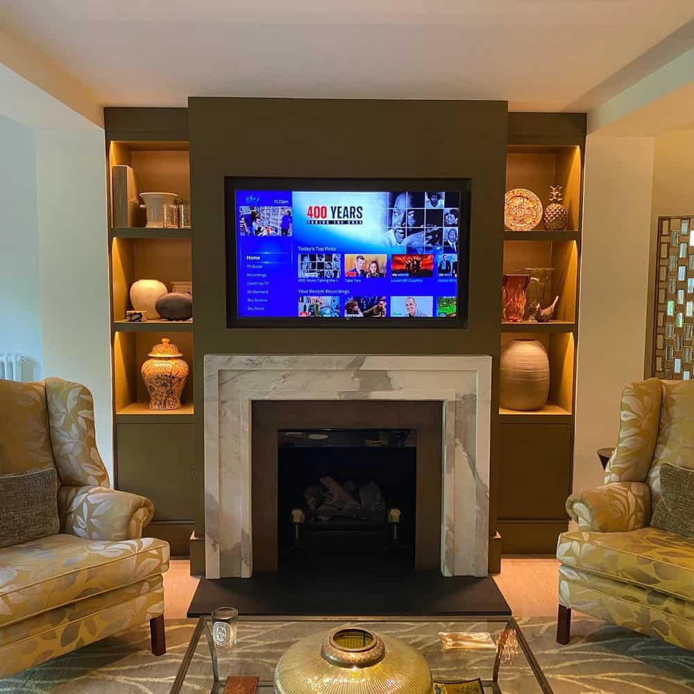 modern fireplace with tv above