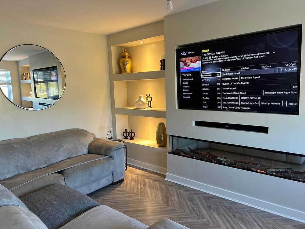 tv and fireplace built in wall