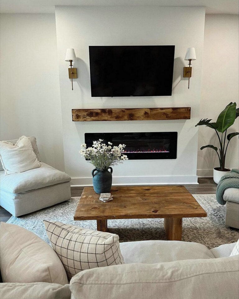 built in fireplace with tv above feature