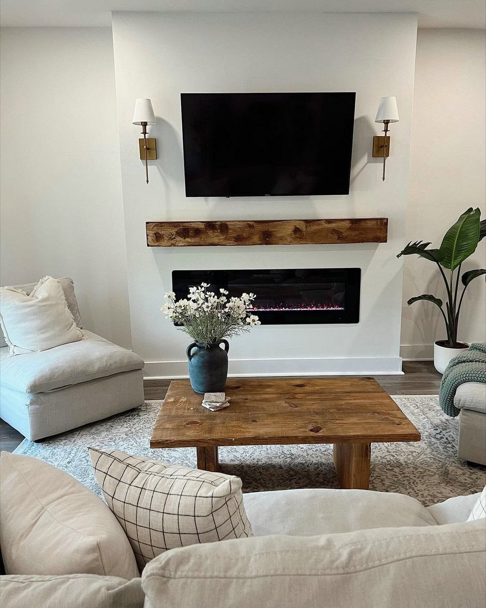 built in fireplace with tv above