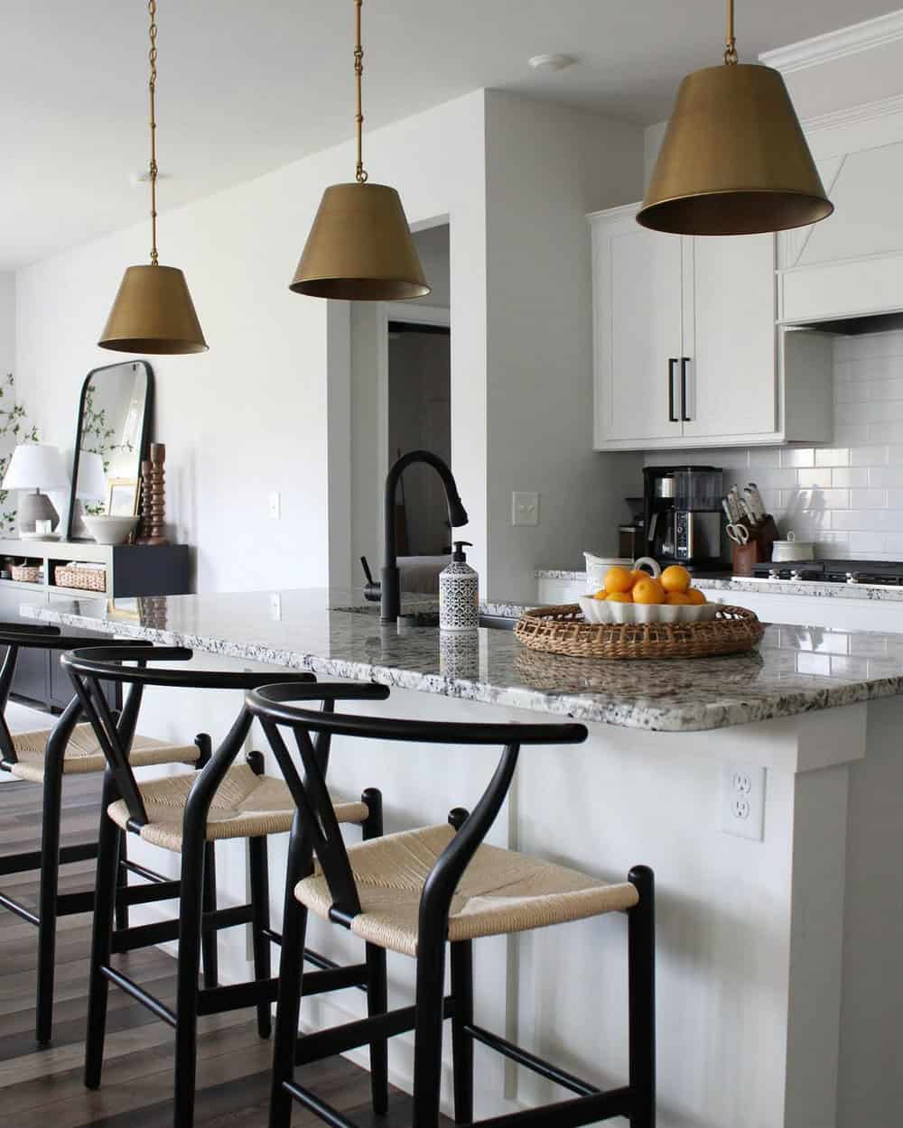 backsplash in kitchen with white cabinets