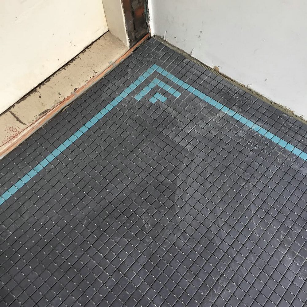 black mosaic tile for shower floor