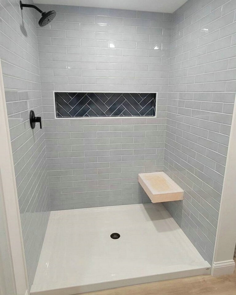 subway tile shower with bench feature