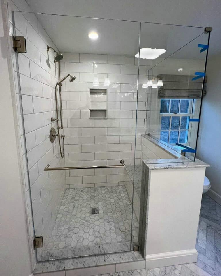 white subway tile shower niche feature