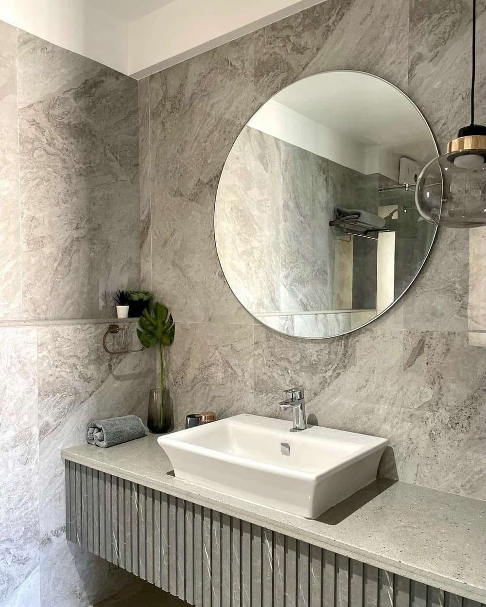 bathroom with gray vanity