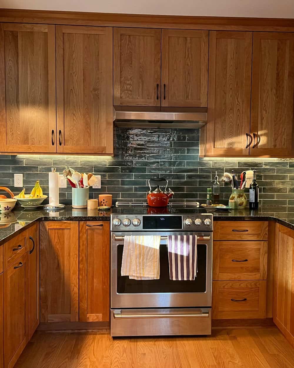 cherry cabinets and backsplash