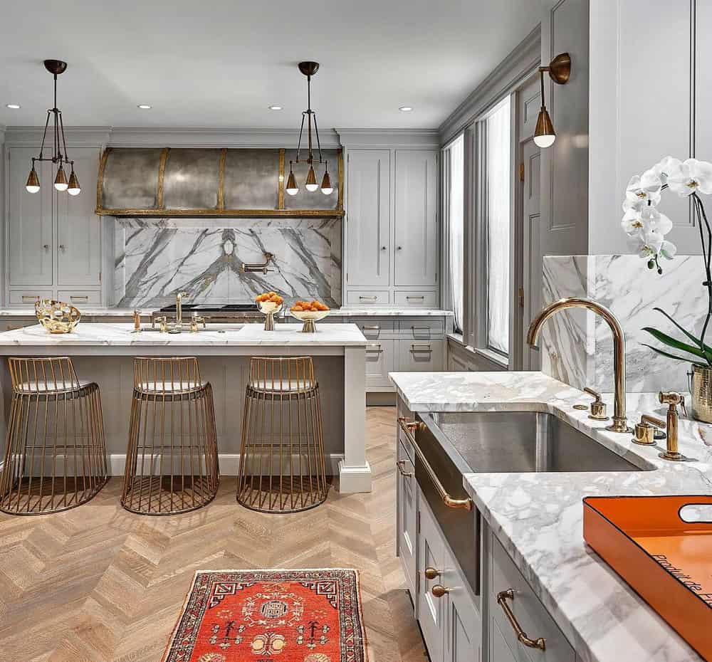 light grey kitchen cabinets with white marble countertops