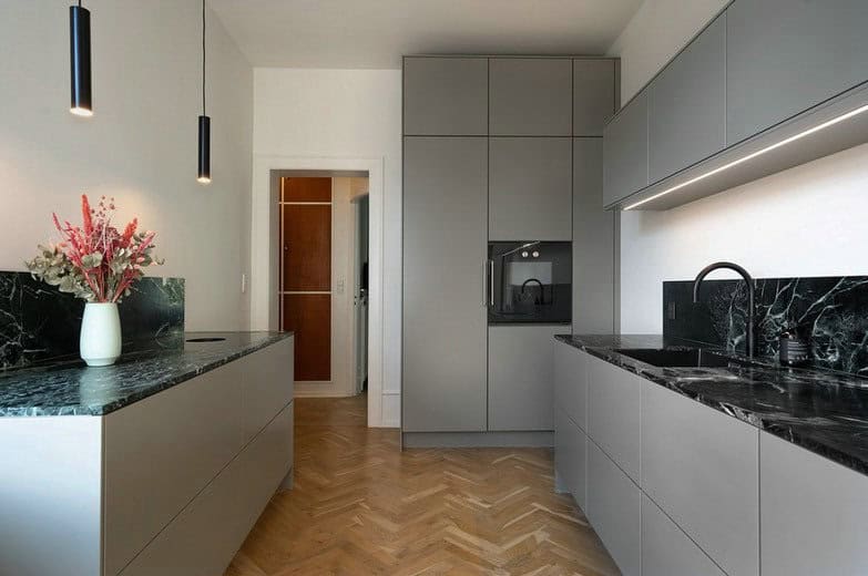 light grey cabinets with dark countertops