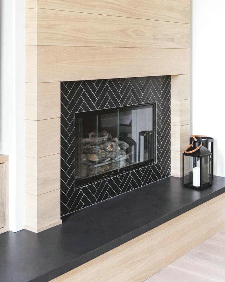 black herringbone tile fireplace feature