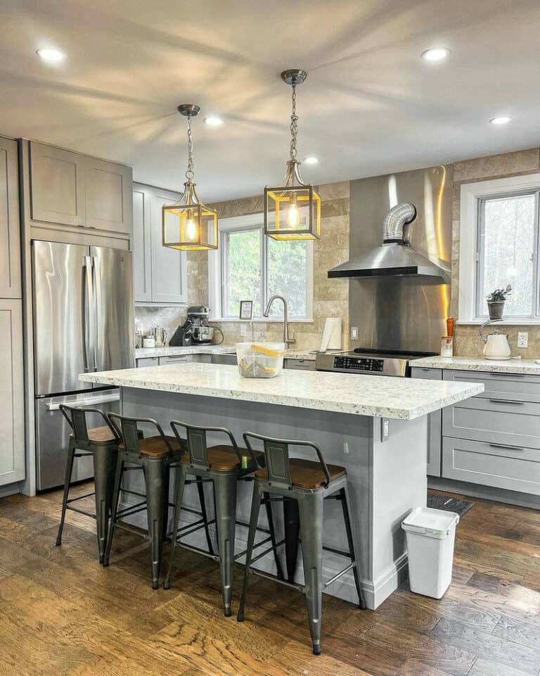 grey cabinets with stainless steel appliances feature