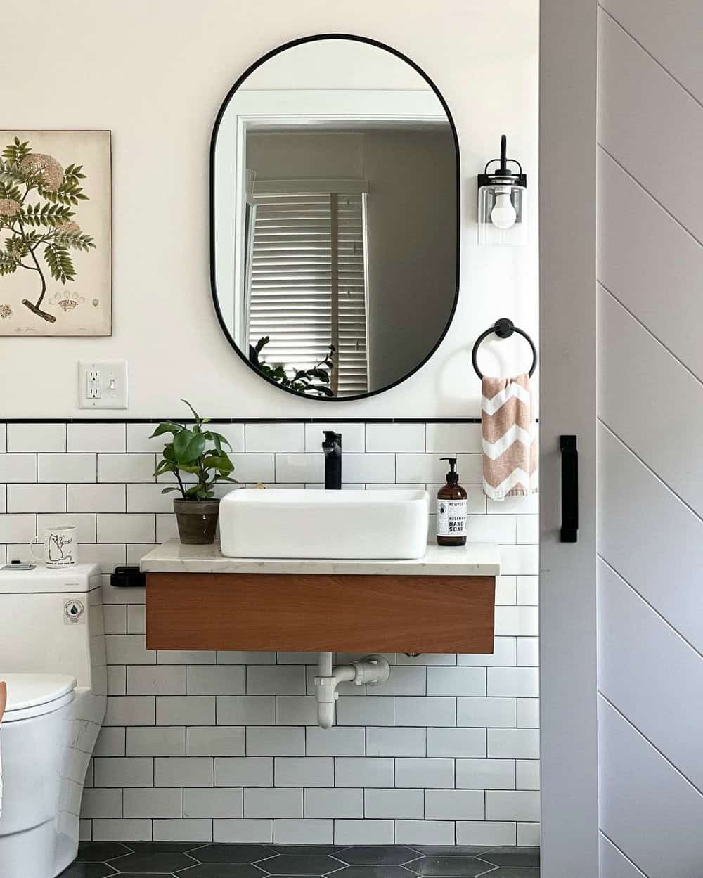 white subway tile backsplash with gray grout