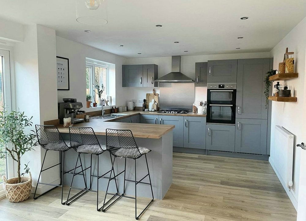 farmhouse grey kitchen cabinets with butcher block countertops