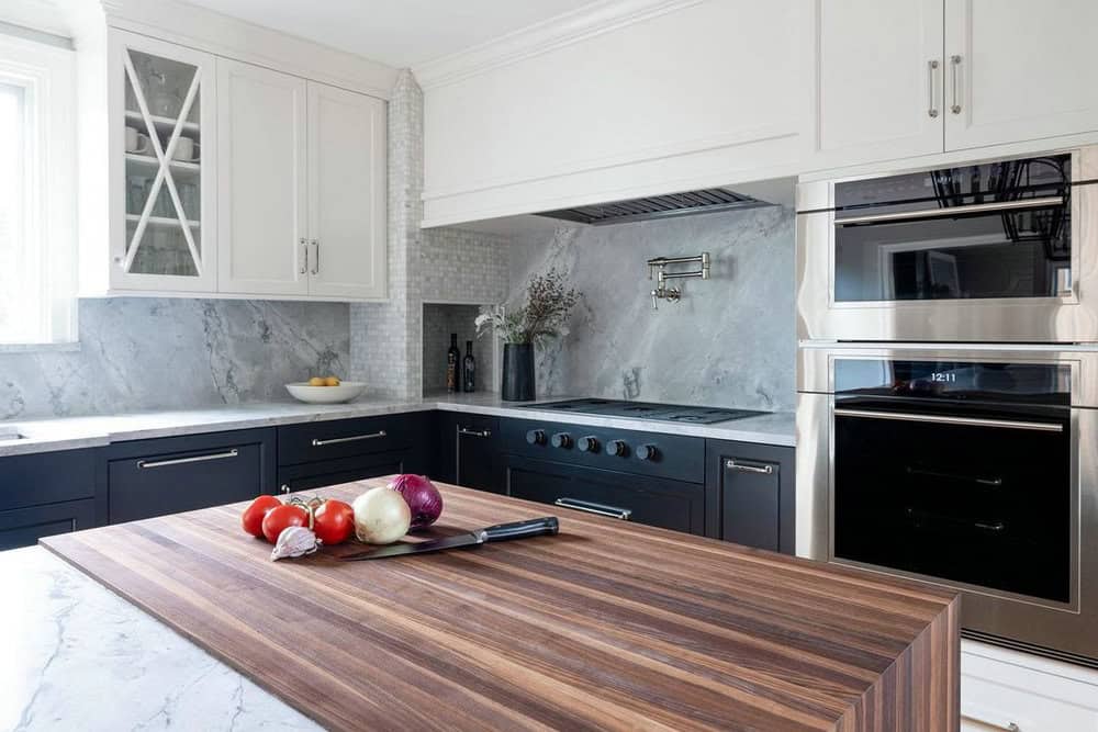 white cabinets with butcher block counters