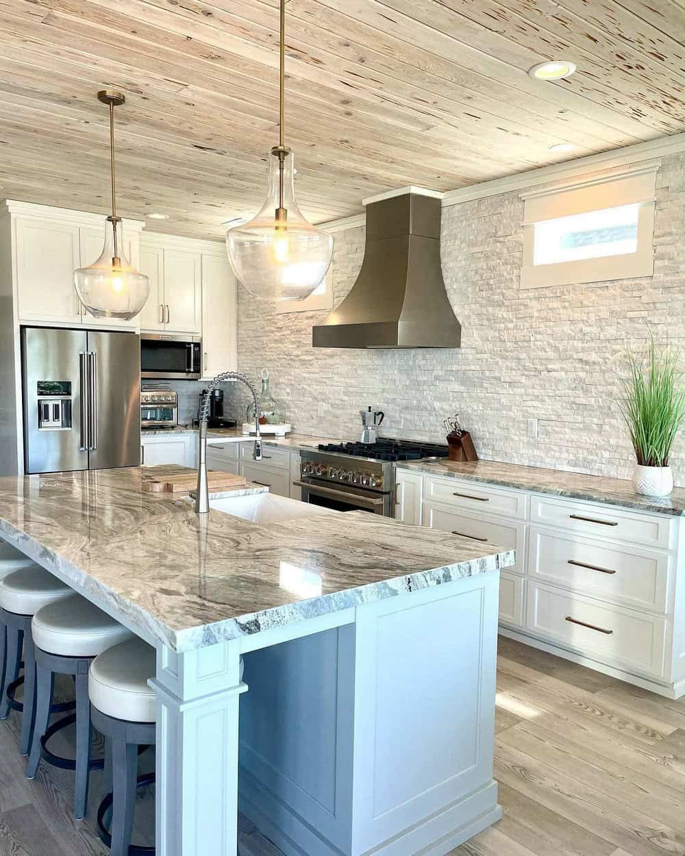 white cabinets with fantasy brown granite