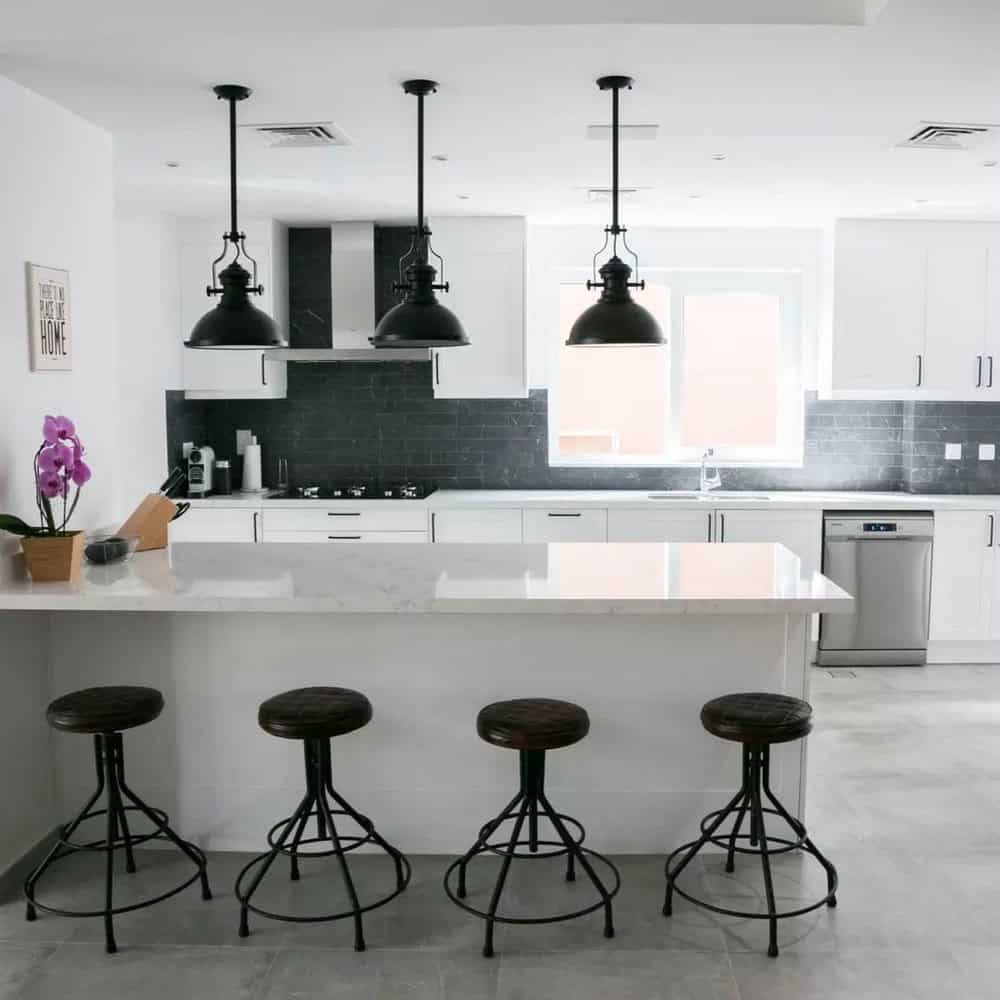 white backsplash with white cabinets