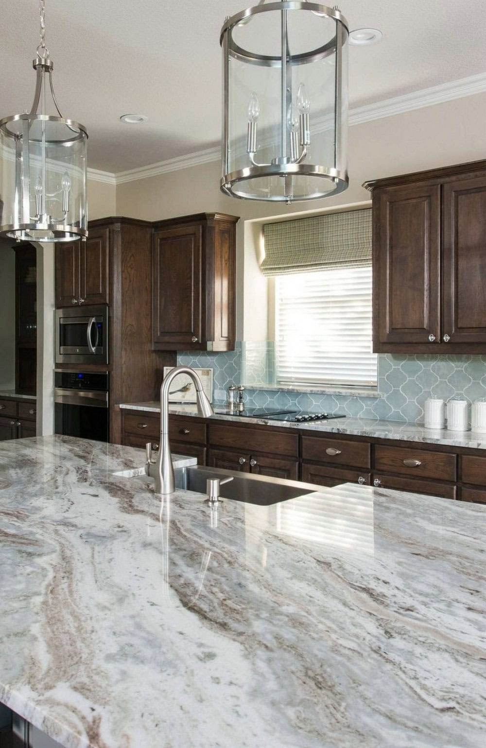 brown fantasy granite with white cabinets