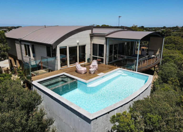 stone around above ground pool feature