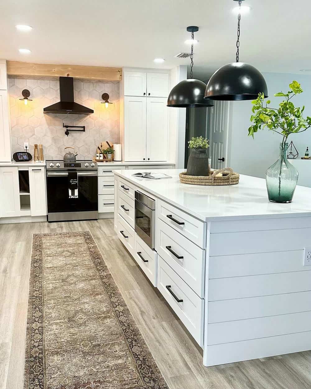 Simple, cool-toned kitchen flooring accentuates a kitchen space