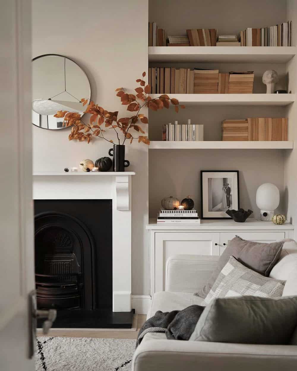 living rooms with black fireplaces
