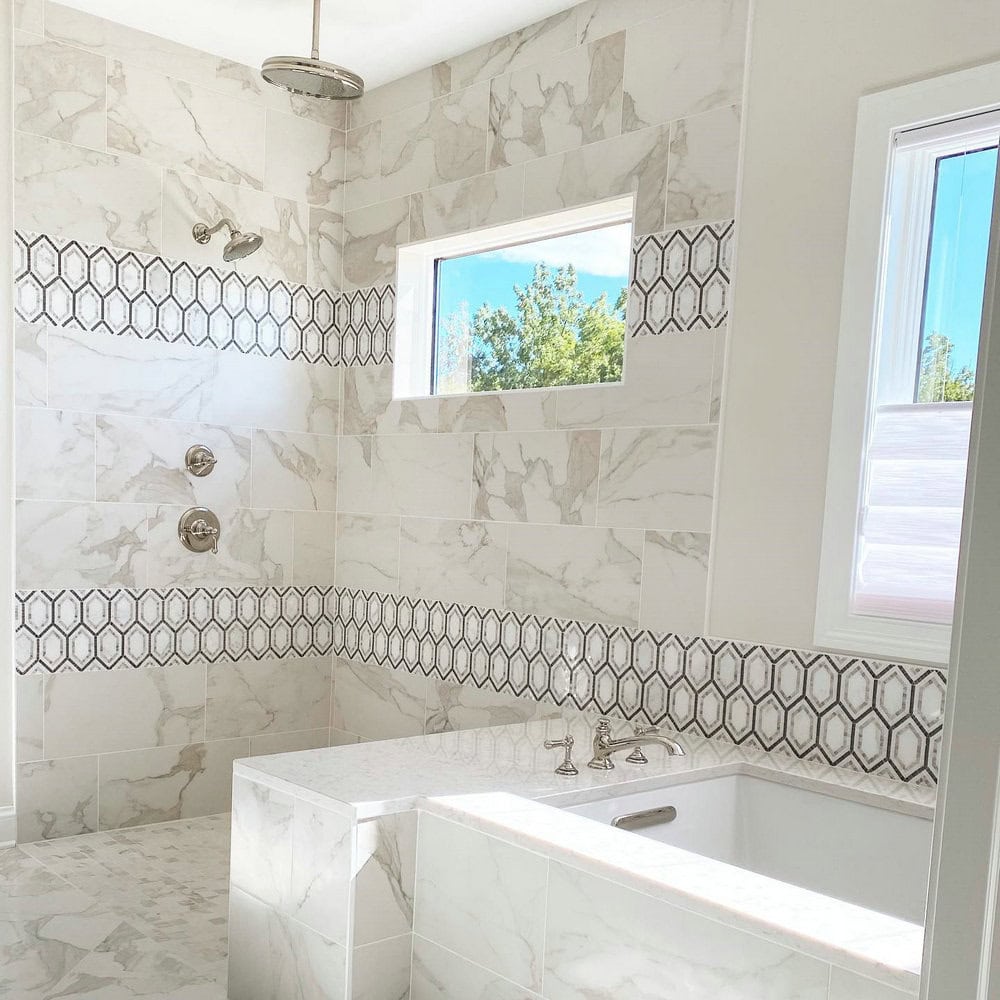 subway tile shower with accent strip