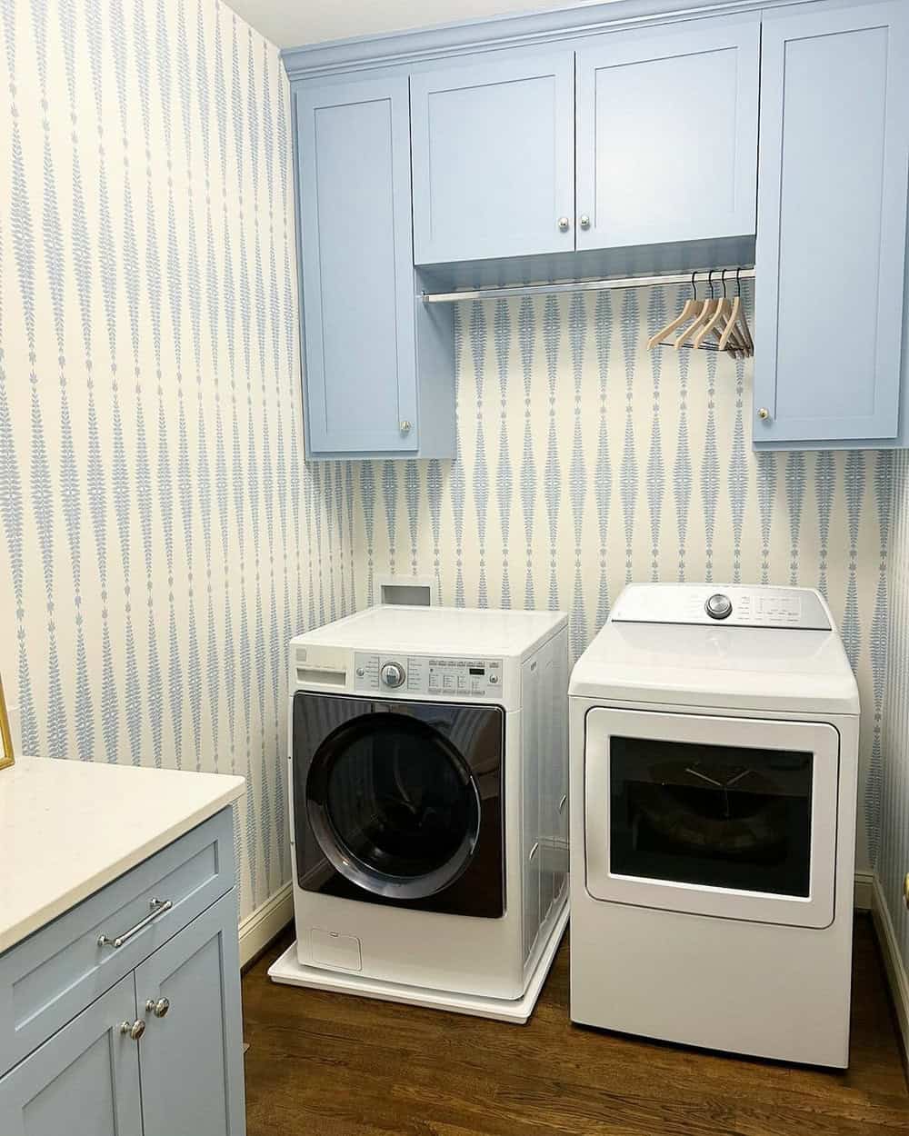 laundry room with top loaders