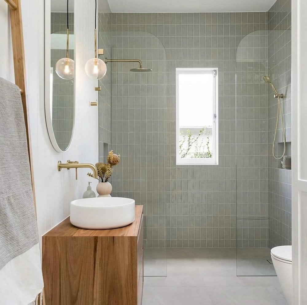 sage green accent wall bathroom