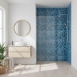 Luxurious walk-in shower with blue glass tile mosaic walls