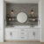 Gray terrazzo tile installed on a modern double vanity bathroom backsplash