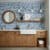 Aquatica blue glass subway tile wall in a rustic bathroom