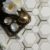 Elegant marble hexagon mosaic tile on a sophisticated kitchen backsplash